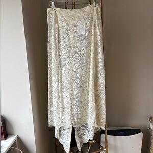 NWT, never worn, size 40 Paco Rabanne ivory lace midi skirt with liner.